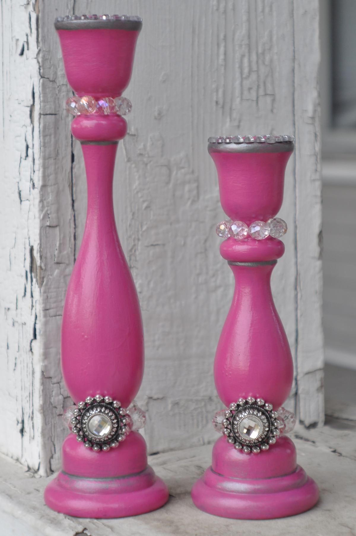 Pink candle holders.